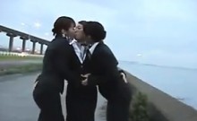 Three Japanese Chicks Kissing Outside