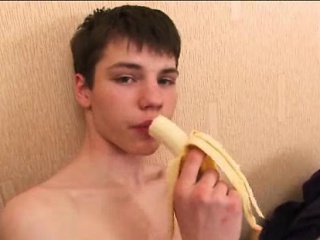 Twink teaser peels a banana and beats his meat