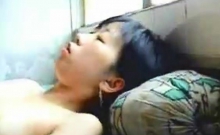 Asian Couple Are Making Love On Bed