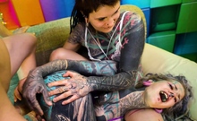 Two tattooed girls get ass fucked by a big dick